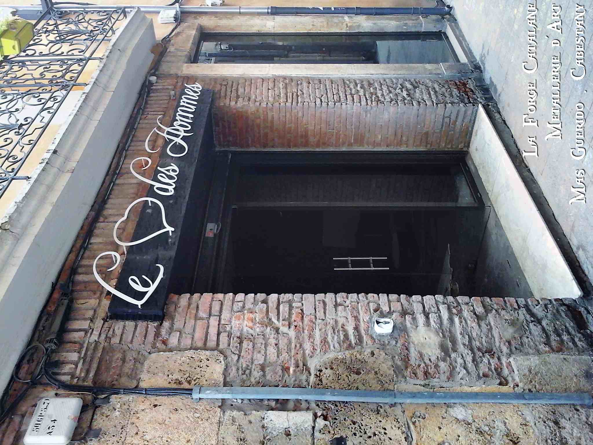 Enseigne decoupe laser le coeur des hommes  forge catalane.jpg